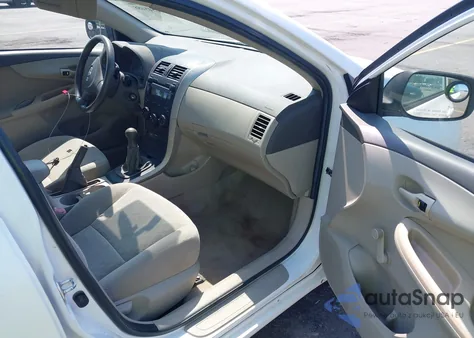 2009 Toyota Corolla из США, поврежденный, VIN 1NXBU40E69Z090434